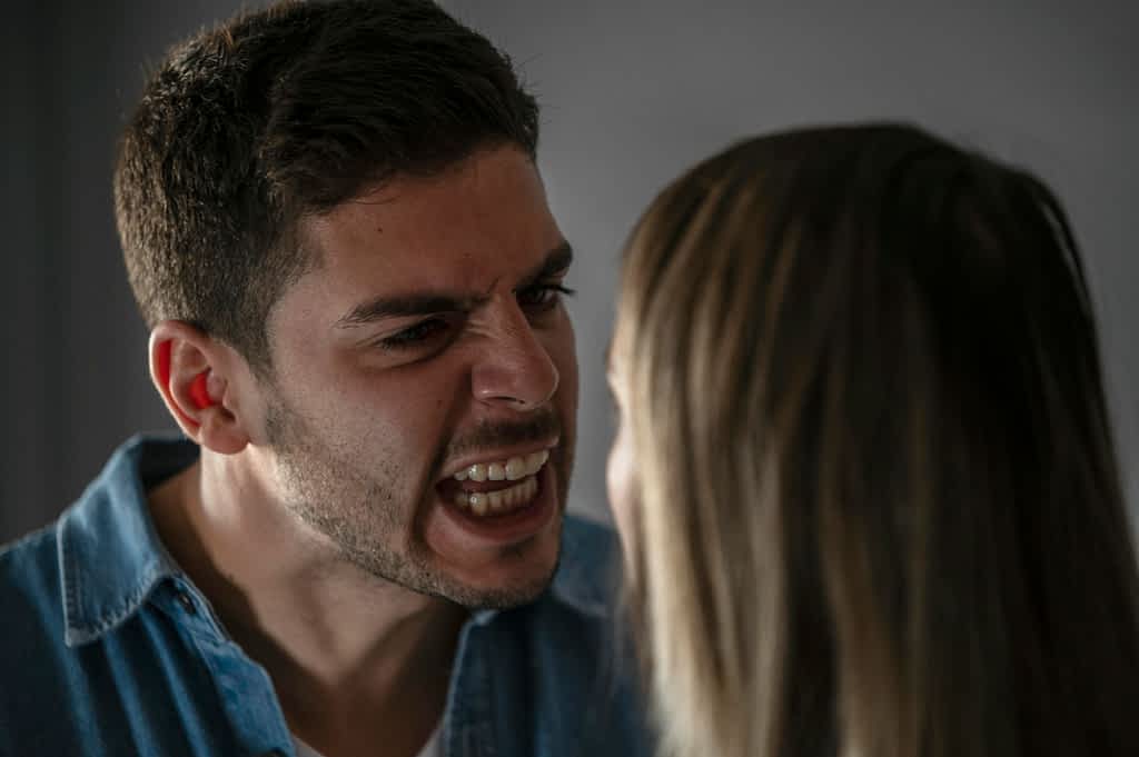 Men Rage Then Act Like Nothing Happened: 7 Chilling Reasons Why 2 man seething at woman in anger. He will rage today and act like nothing happened tomorrow