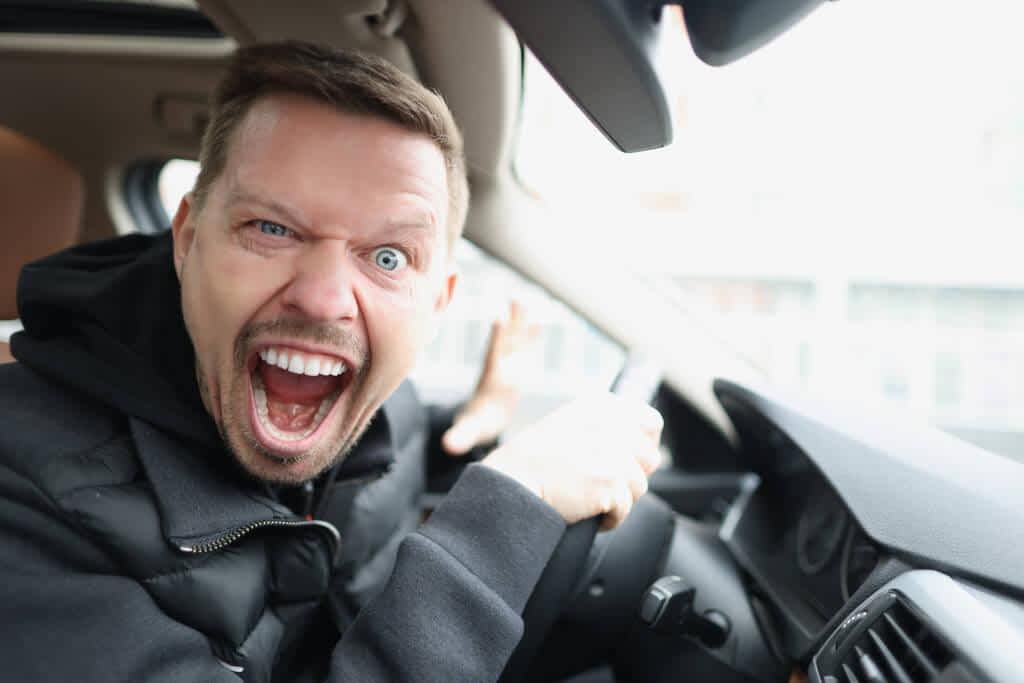 Anger in Marriage: 15 Critical Warnings Your Husband’s Rage Is Tearing You Apart 2 mad man driver shouts in passenger compartment