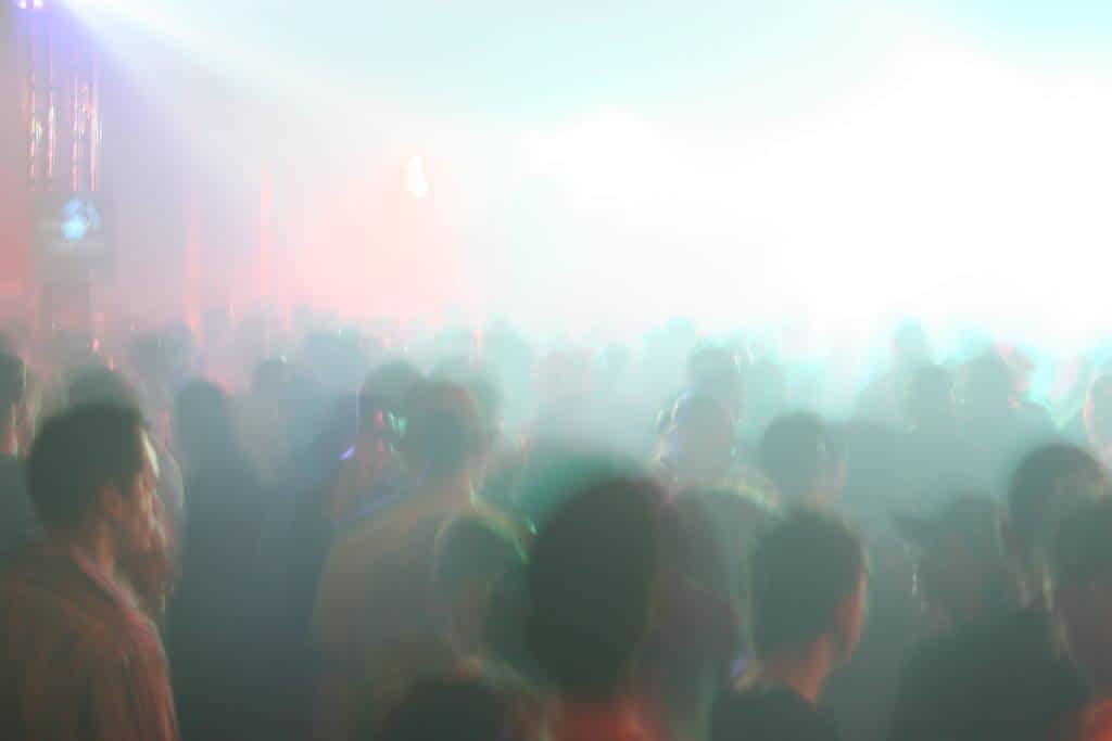 silhouettes people having fun concert party