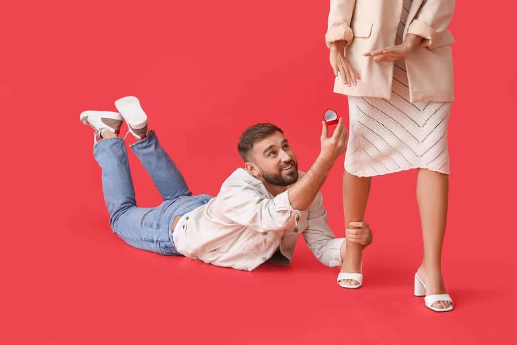 9 Absurd Reasons Why Happily Single Women Trigger Men 15 woman rejecting marriage proposal color background