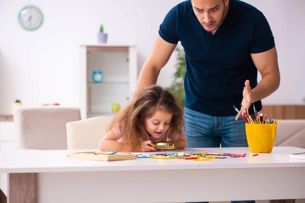 Helicopter Parenting and Narcissism: The Hidden Connection 10 young father and little girl indoors