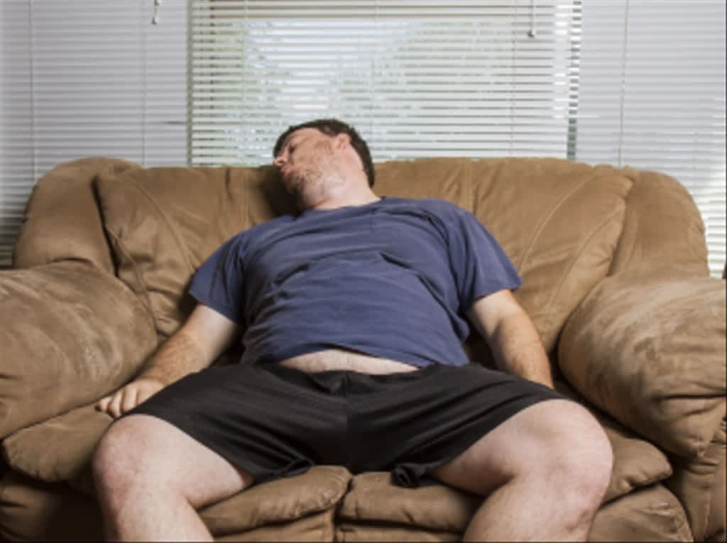 11 Types of Men Who Get Dumped: Brutal Reasons Women Leave 6 lazy man relaxing on the couch