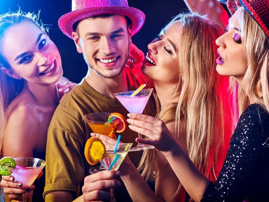 9 Fake Alpha Male Traits: Eye-Opening Ways to Spot a Phony 2 dance party with confident alpha male dancing and disco ball