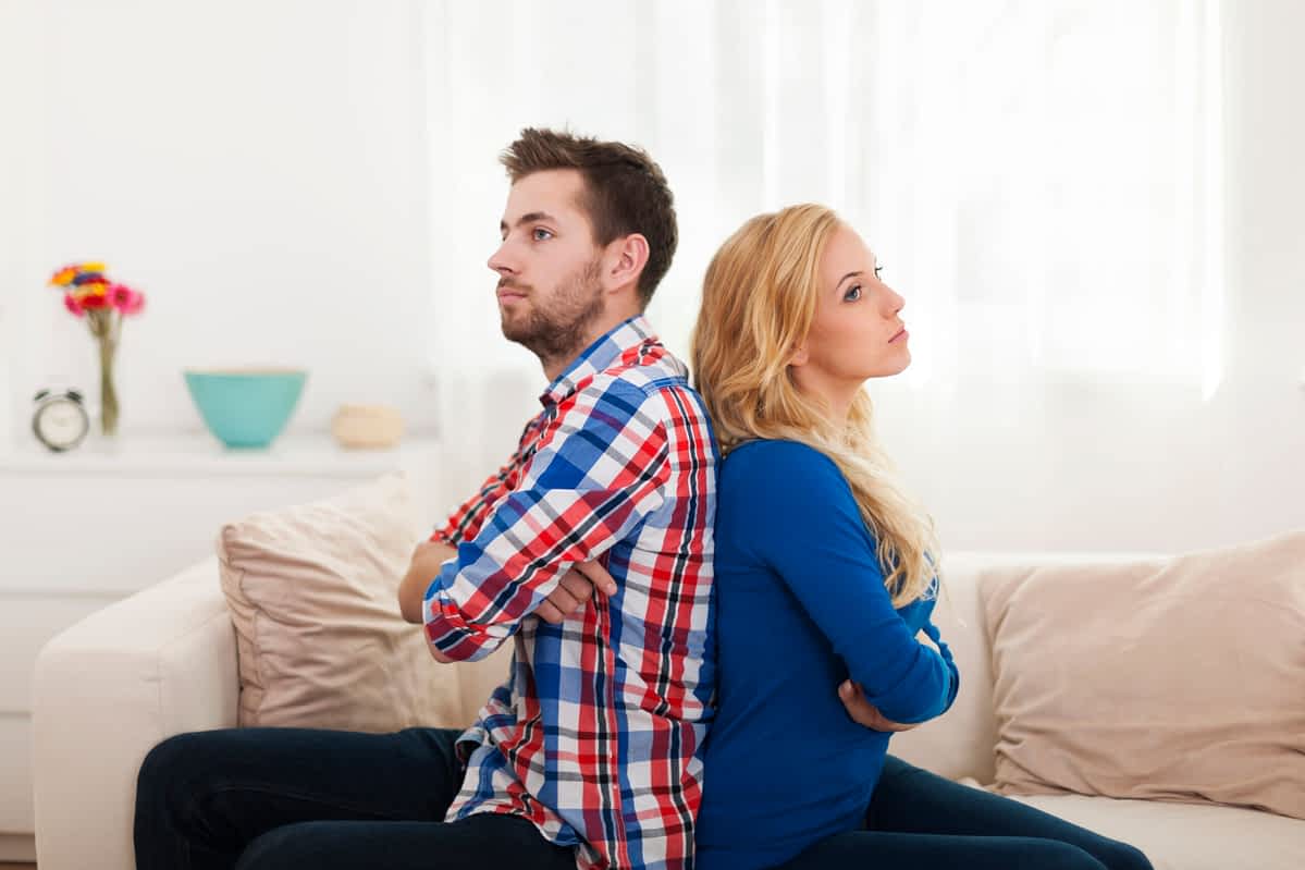 angry couple ignoring each other with silent treatment