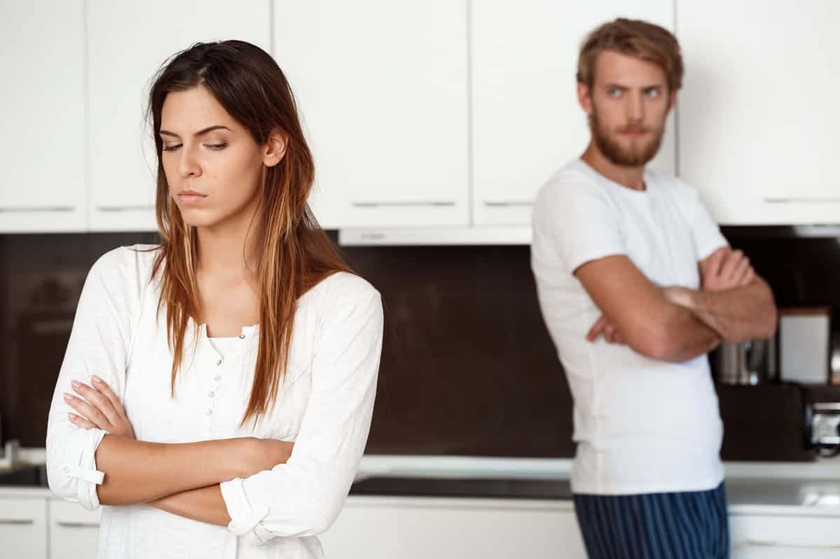 Woman angry at her man because he's testing your relationship boundaries
