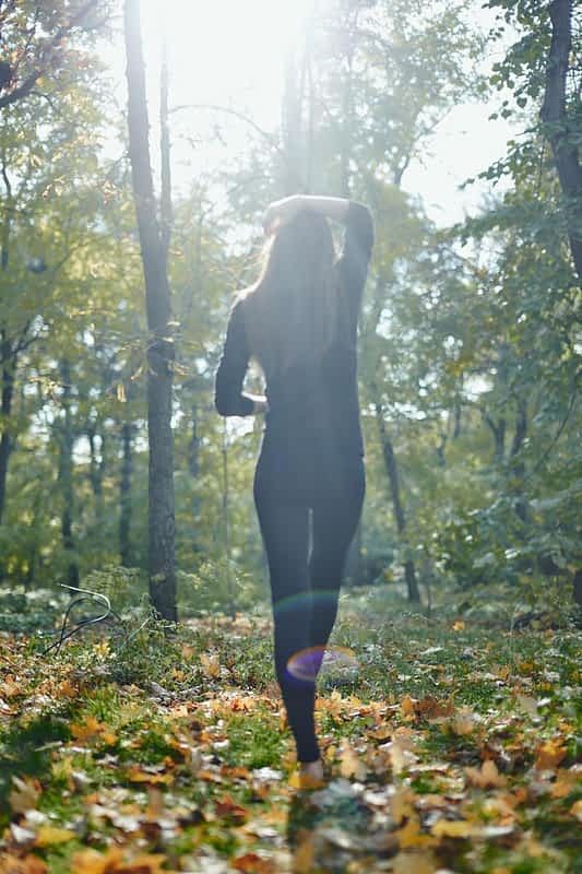 young woman posing at local park