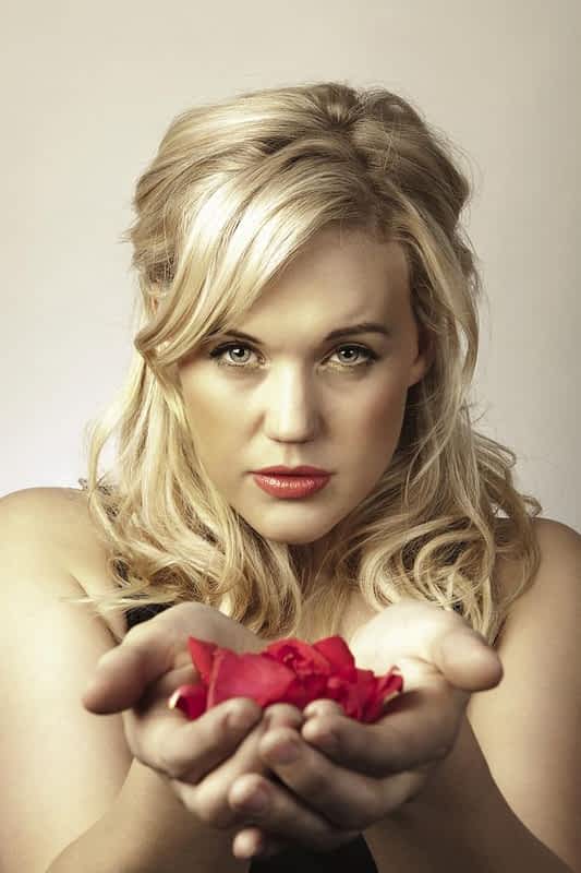 Why Men Mistake Kindness For Flirting 7 stock photo woman in love flowers