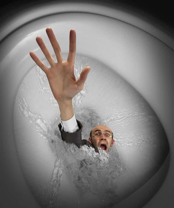9 Absurd Reasons Why Happily Single Women Trigger Men 9 businessman sinking in toilet bowl
