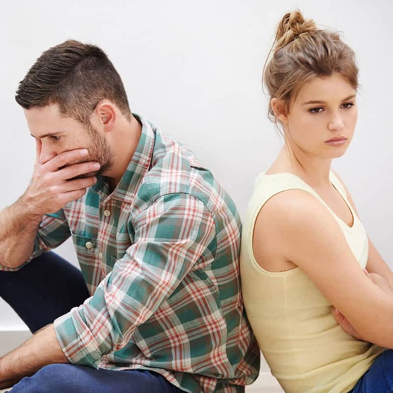 stock photo theyve reached stalemate young couple having relationship difficulties sitting back