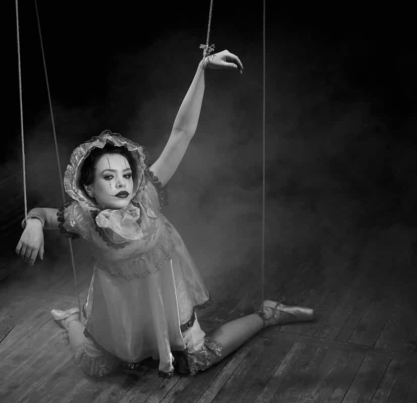 woman puppet symbolic of control